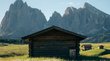 Hotels auf der Seiser Alm: unter Alpengipfeln genießen Holzhütte auf blühender Wiese mit Bergen im Hintergrund bei klarem Himmel