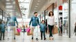 Outlet Center Brenner Famiglia che fa shopping in un centro commerciale con borse in mano